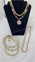 4 Pearl like necklaces. 3 stranded choker - 10