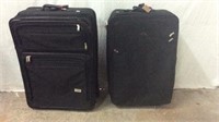 Two Large Black Lloyd Suitcases T11A