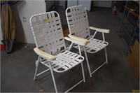 Two Vinyl Strap Folding Beach/Patio Chairs. Very