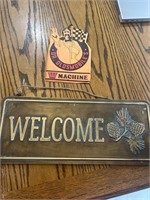 Signs “ w machine” and “ welcome”