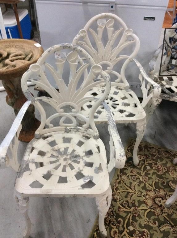 Four piece wrought iron outdoor garden chairs
