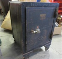 antique "meilink's" safe on casters (31in tall)