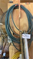 Air hoses, heavy duty electric cords, rock bar