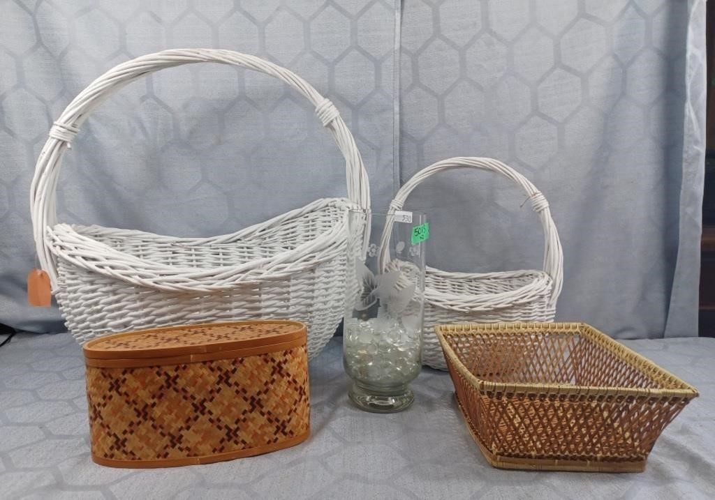 Wicker baskets and glass vase