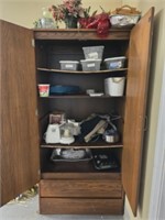 Faux wood cabinet and contents