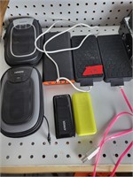 Lot of portable speakers and chargers