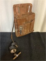 G) vintage lineman’s leather toolbelt, and good