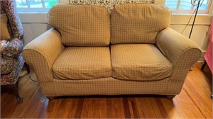 Overstuffed two person sofa, loveseat, with four