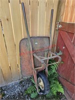Vintage Metal wheel barrow (back yard)