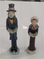 Two Christmas Singer Figurines