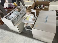 The Danbury mint doll in high chair and doll in