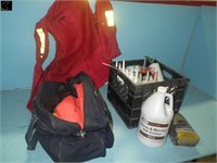 Crate of misc caulking hi-vis vest, wet suit, etc
