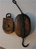 2 Wooden pulleys.