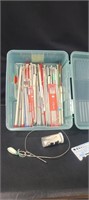 Large assortment of knitting needles with tote