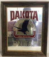 Dakota wheat brewed beer on tap mirrored beer