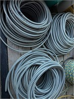 4 Piles of 4-Wire Prewired Commercial Flex Conduit