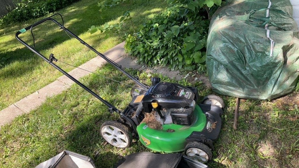 Lawn boy, self-propelled mower with bagger