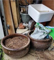 Group of flower pots, lumber and misc