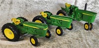 Three John Deere Die Cast Tractors
