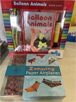 Paper airplanes + ballon animals- new