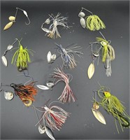 Various fishing hooks with attached bait and
