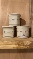 Longaberger crocks w/lids.  (4"h)