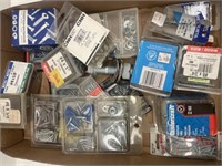 Assorted rivets, screws, and other fasteners.