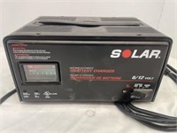 Solar Battery Charger. 6/12V. Turns on.