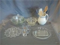 Pitcher with serving utensils, coffee mugs,