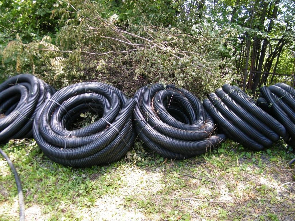 5 BUNDLES OF 4" DRAIN PIPES