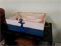 wooden box with an anchor