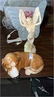 Dog and angel statue