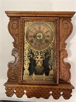 Sessions Hanging  clock And hand carved oak