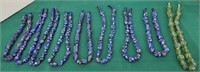 9 strands of glass beads blues and greens