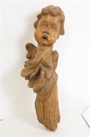 A Spanish Colonial carved cherubic head very old