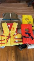 4 LIFE PRESERVERS - 2 ADULTS AND 2 CHILDREN