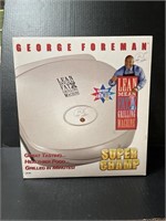 George Foreman, super champ grilling machine