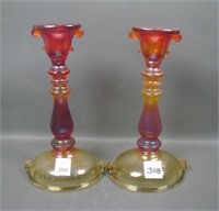 Two Imperial Red Double Scroll Candlesticks