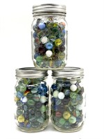 (3) Ball Jars Full of Marbles 
- Jars are 5.25”