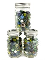 (3) Ball Jars Full of Marbles 
- Jars are 5.25”