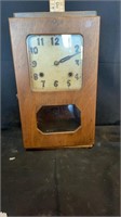vintage wooden clock with pendulum