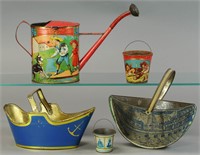 FOUR EARLY SANDPAILS AND AN EMBOSSED WATERING CAN