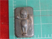 Cast iron Kewpie Doll Paperweight.