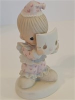 Precious Moments figurine put on a happy face