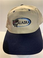 Alaska snap to fit ball cap appears in good shape