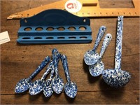 Blue graniteware spoons and ladle