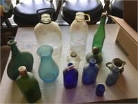 Mixed colored vases, jars etc