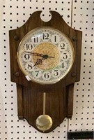 Beautiful wooden wall clock with pendulum