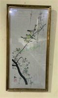 Oriental artwork of birds on a branch during
