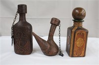3 vintage leather covered decanters
